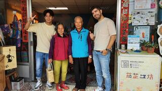 Antony and Tujia take photo with Ga Ji work shop