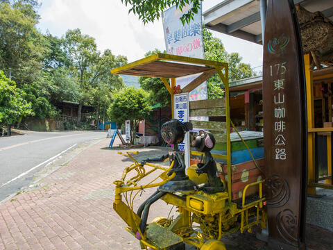 Artist decorations of farmer at Plum Garden