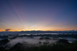 Astonishing view of rolling sea of cloud and sunrise